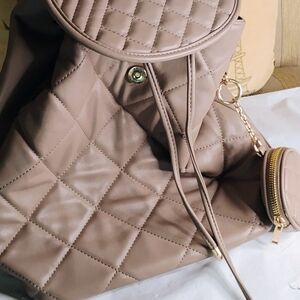 Sophisticated Tan Quilted Backpack with Gold Hardware